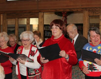 VMP West Allis Senior Community Club Choir members singing at concert