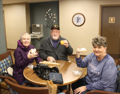 VMP West Allis Senior Community Club seniors enjoying paczkis on Fat Tuesday